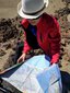 Reading a map while hiking in Teide National Park